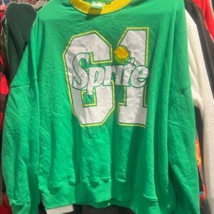 Adult size medium sweatshirt, Sprite, green color measures 25 pit to pit